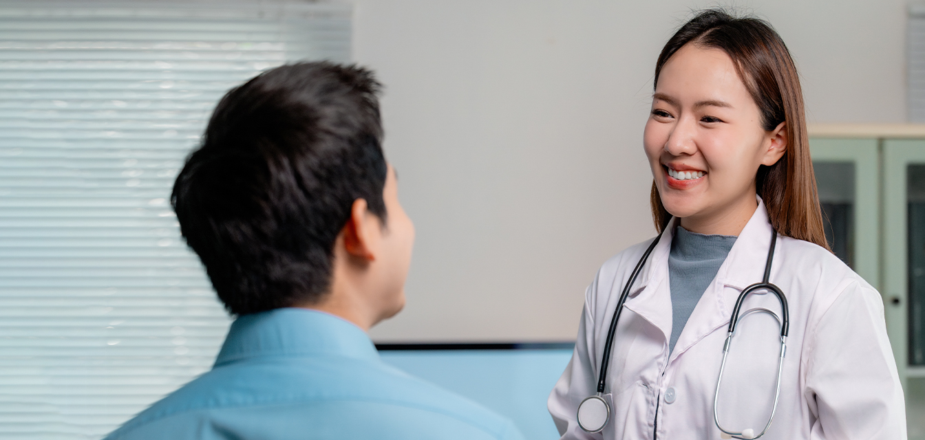 Doctor checking on a patient
